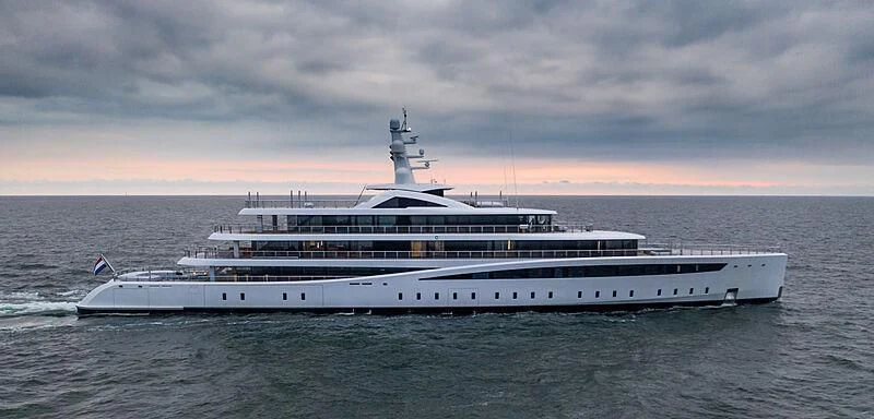 a large cruise ship in the water aboard DEFY Yacht for Sale