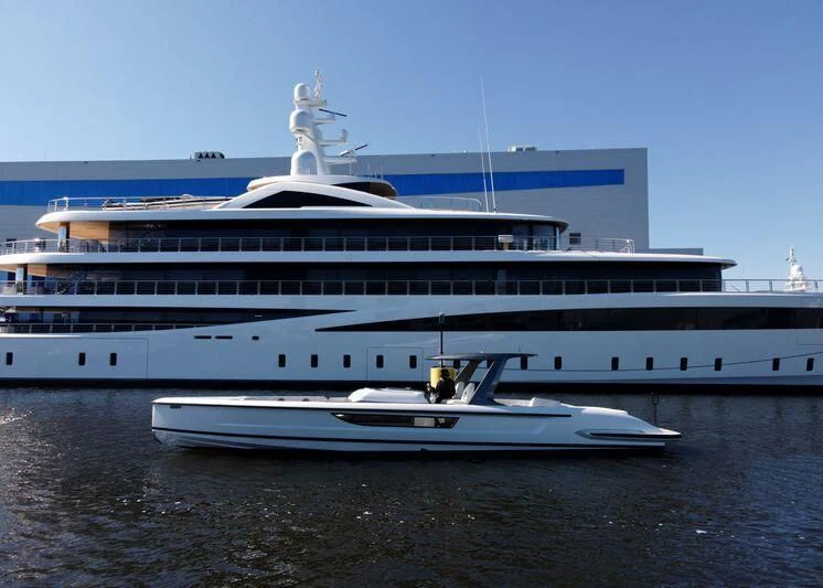 a large cruise ship in the water aboard DEFY Yacht for Sale