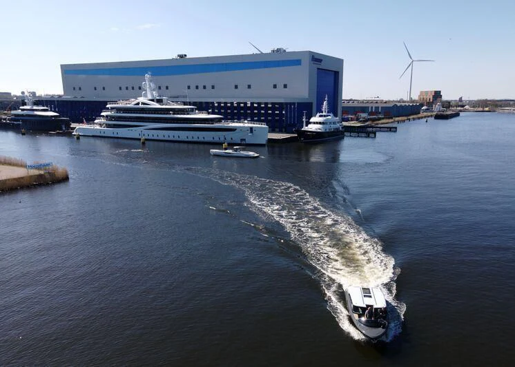 a group of boats in a harbor aboard DEFY Yacht for Sale