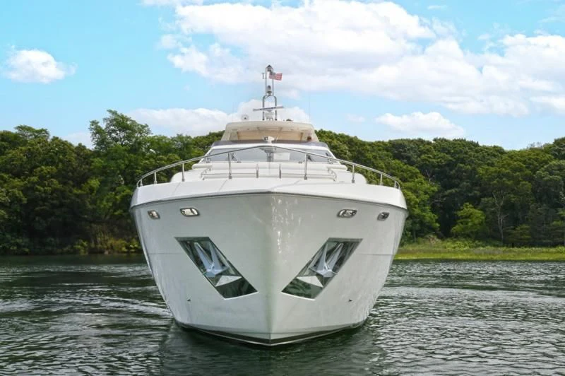 a white boat on the water aboard IN TOO DEEP Yacht for Sale