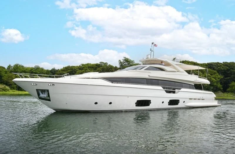 a white yacht on the water aboard IN TOO DEEP Yacht for Sale