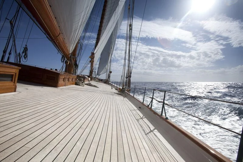 a wooden bridge over water aboard ELENA OF LONDON Yacht for Sale