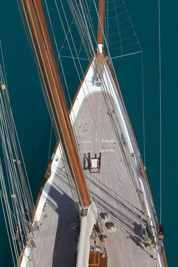 a large sailboat with a white mast aboard ELENA OF LONDON Yacht for Sale
