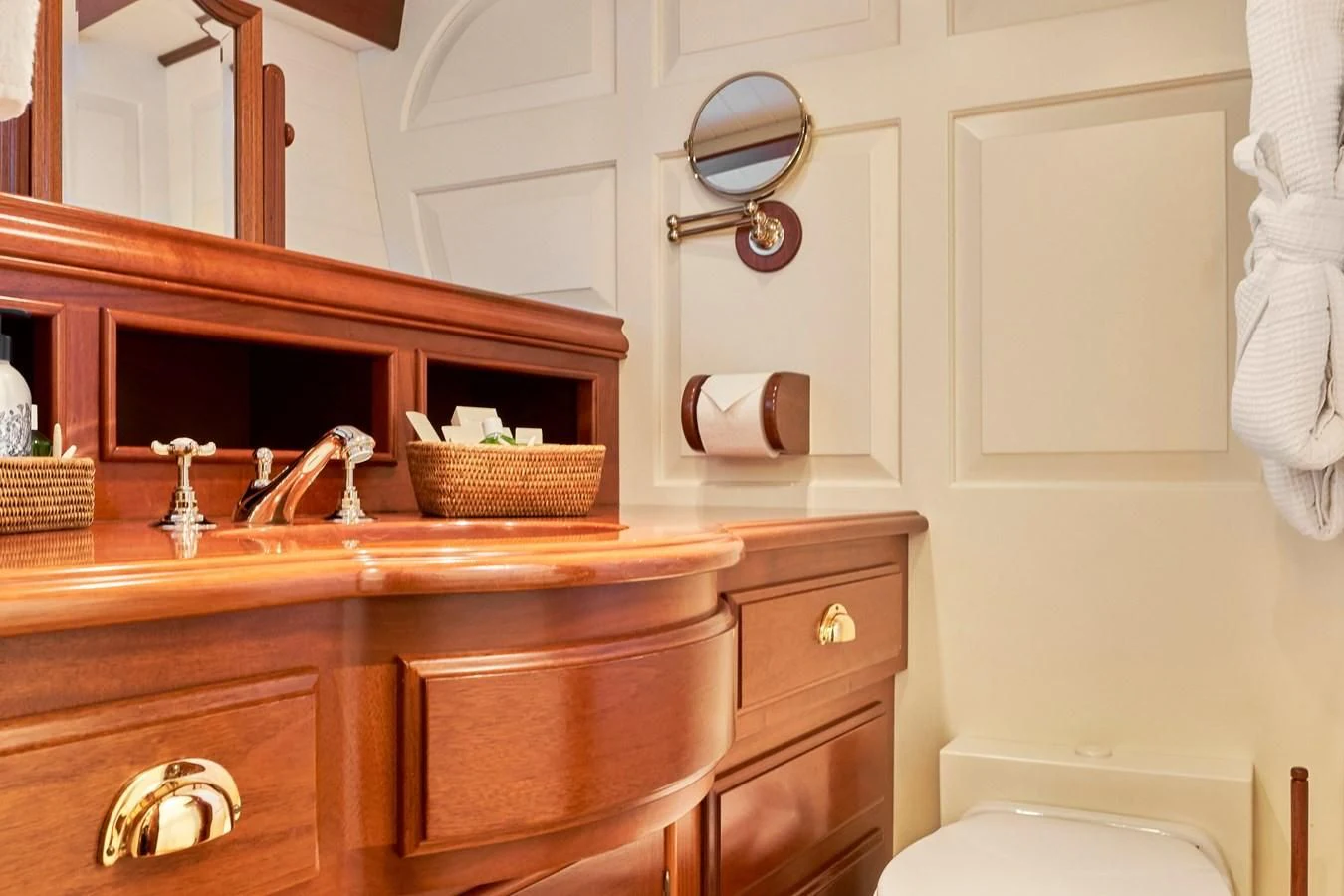 a bathroom with a mirror and a sink aboard ELENA OF LONDON Yacht for Sale