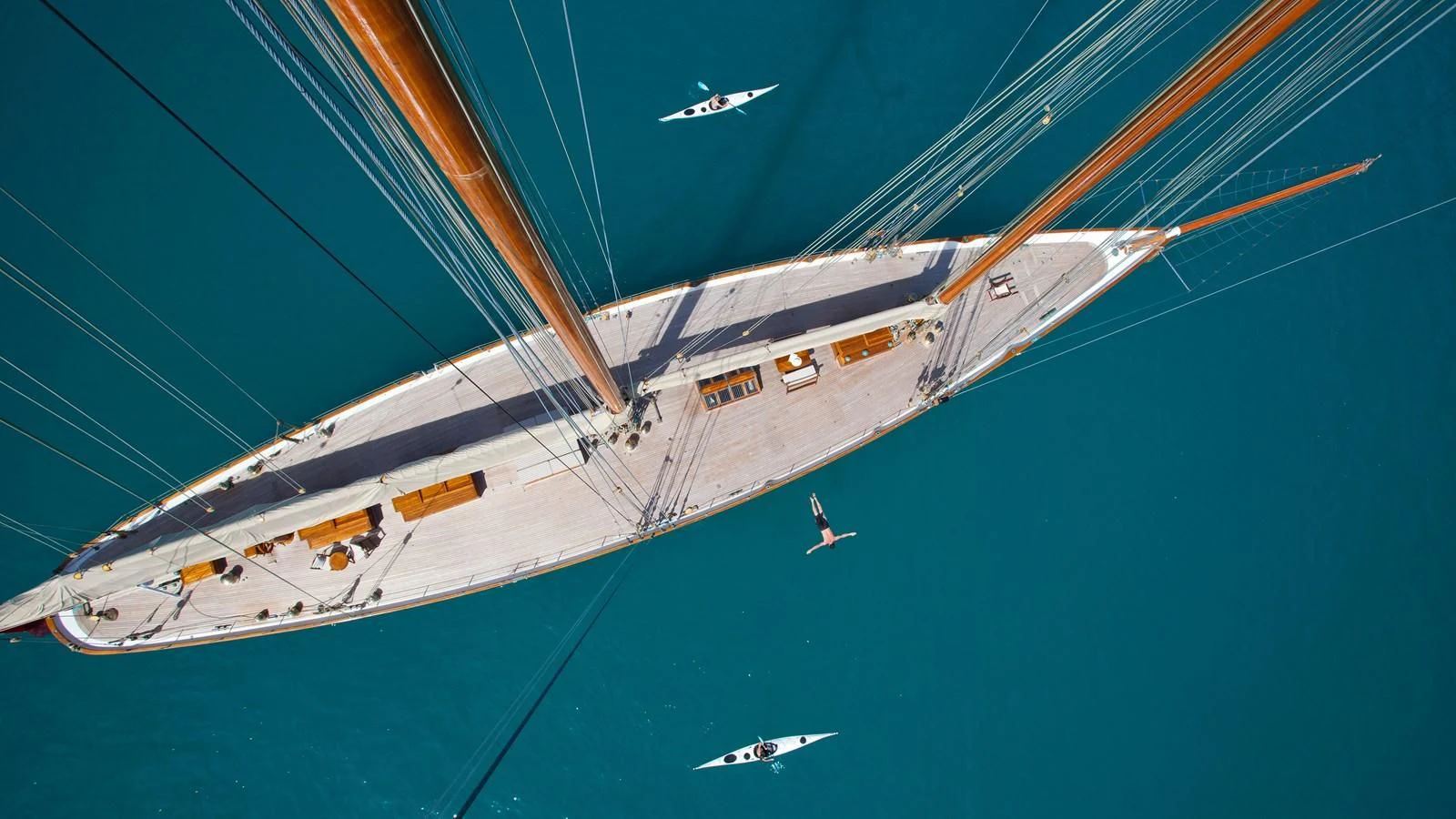 a space shuttle flying over a planet aboard ELENA OF LONDON Yacht for Sale