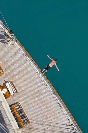 a person climbing a wall aboard ELENA OF LONDON Yacht for Sale