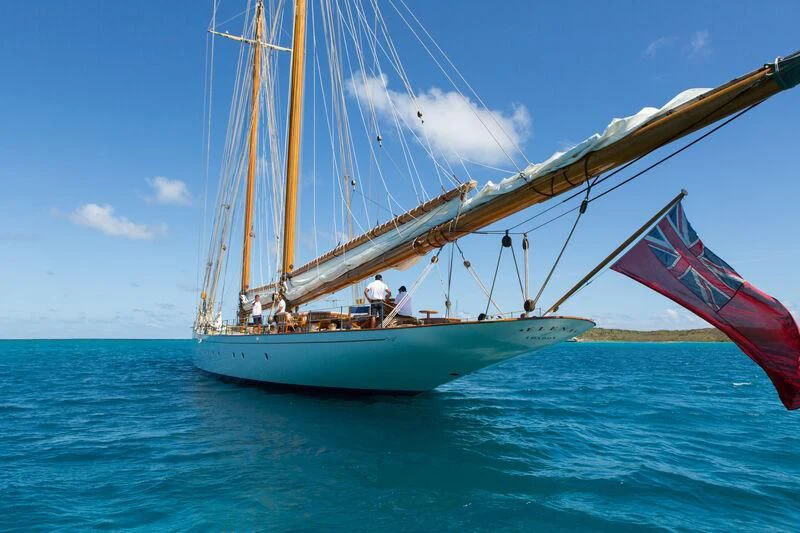 a sailboat with a large sail aboard ELENA OF LONDON Yacht for Sale