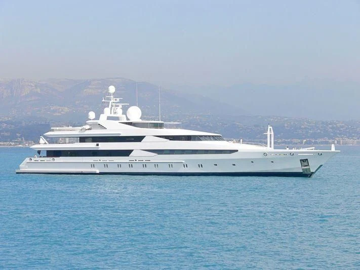 a large white yacht in the water aboard CONSTELLATION Yacht for Sale