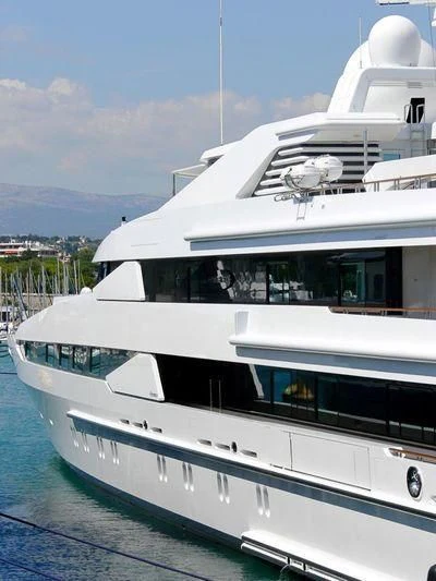 a white yacht on the water aboard CONSTELLATION Yacht for Sale