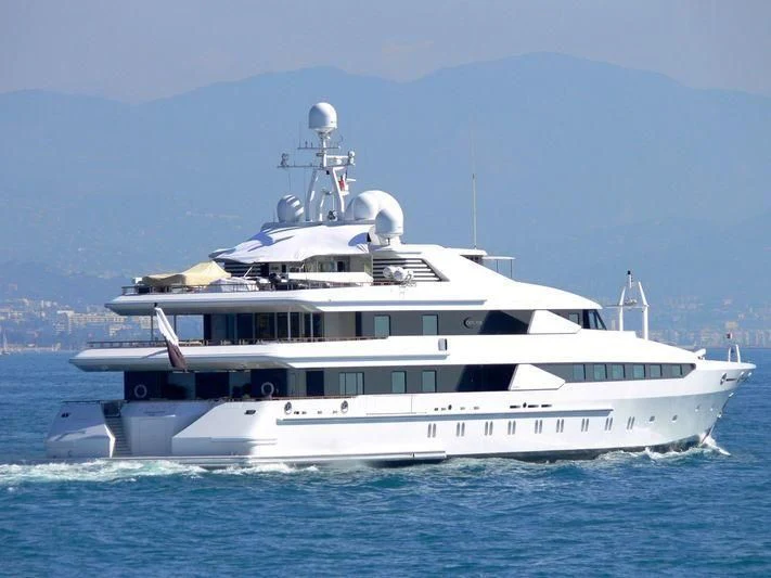 a white yacht in the water aboard CONSTELLATION Yacht for Sale