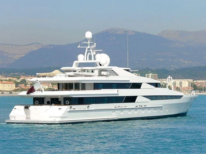 a white yacht in the water aboard CONSTELLATION Yacht for Sale
