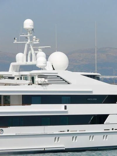 a white yacht with a white domed roof aboard CONSTELLATION Yacht for Sale