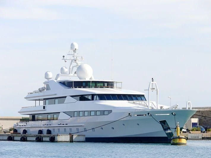 a large white boat in the water aboard CONSTELLATION Yacht for Sale