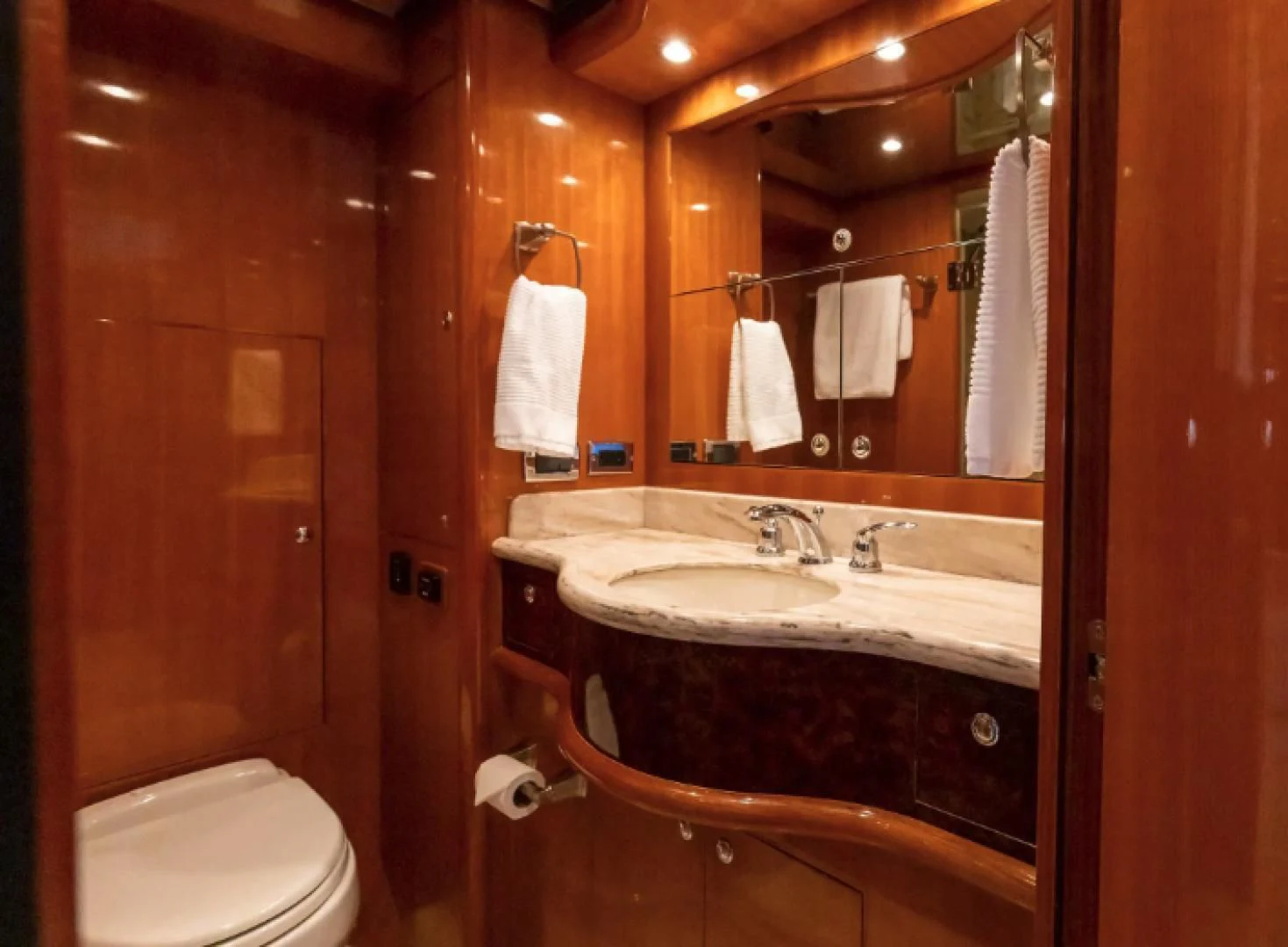 a bathroom with a sink and toilet aboard WRITE SOON Yacht for Sale