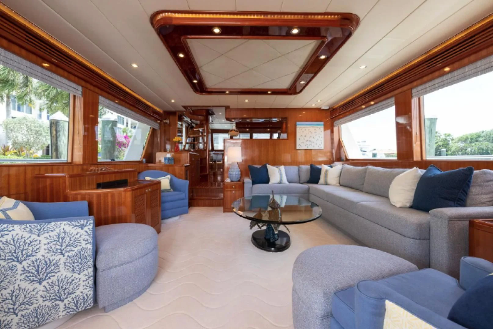 a living room with a couch and a table aboard WRITE SOON Yacht for Sale