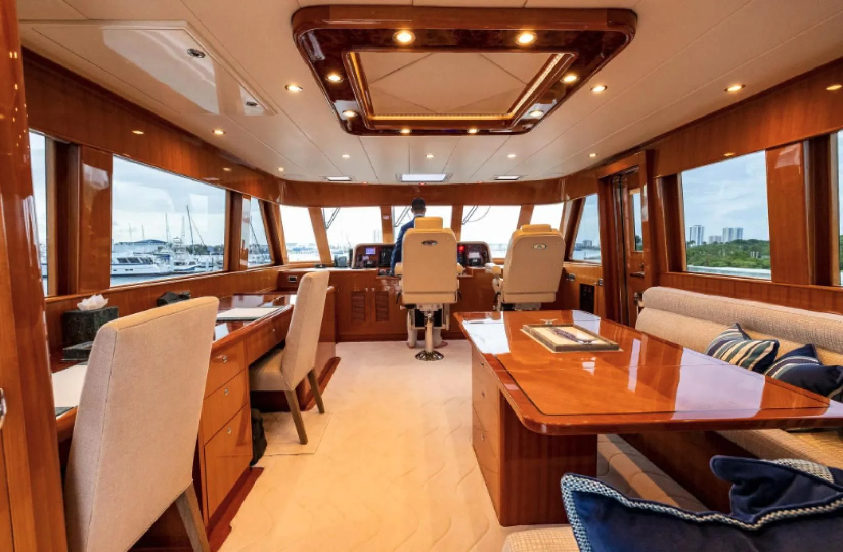a room with a table and chairs aboard WRITE SOON Yacht for Sale