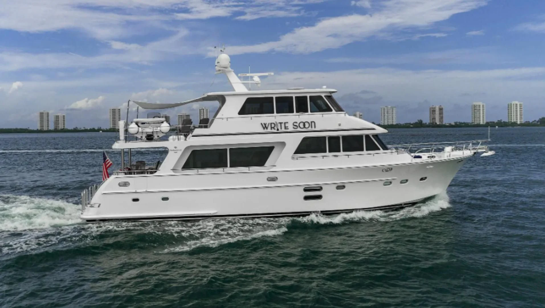 a white boat in the water aboard WRITE SOON Yacht for Sale