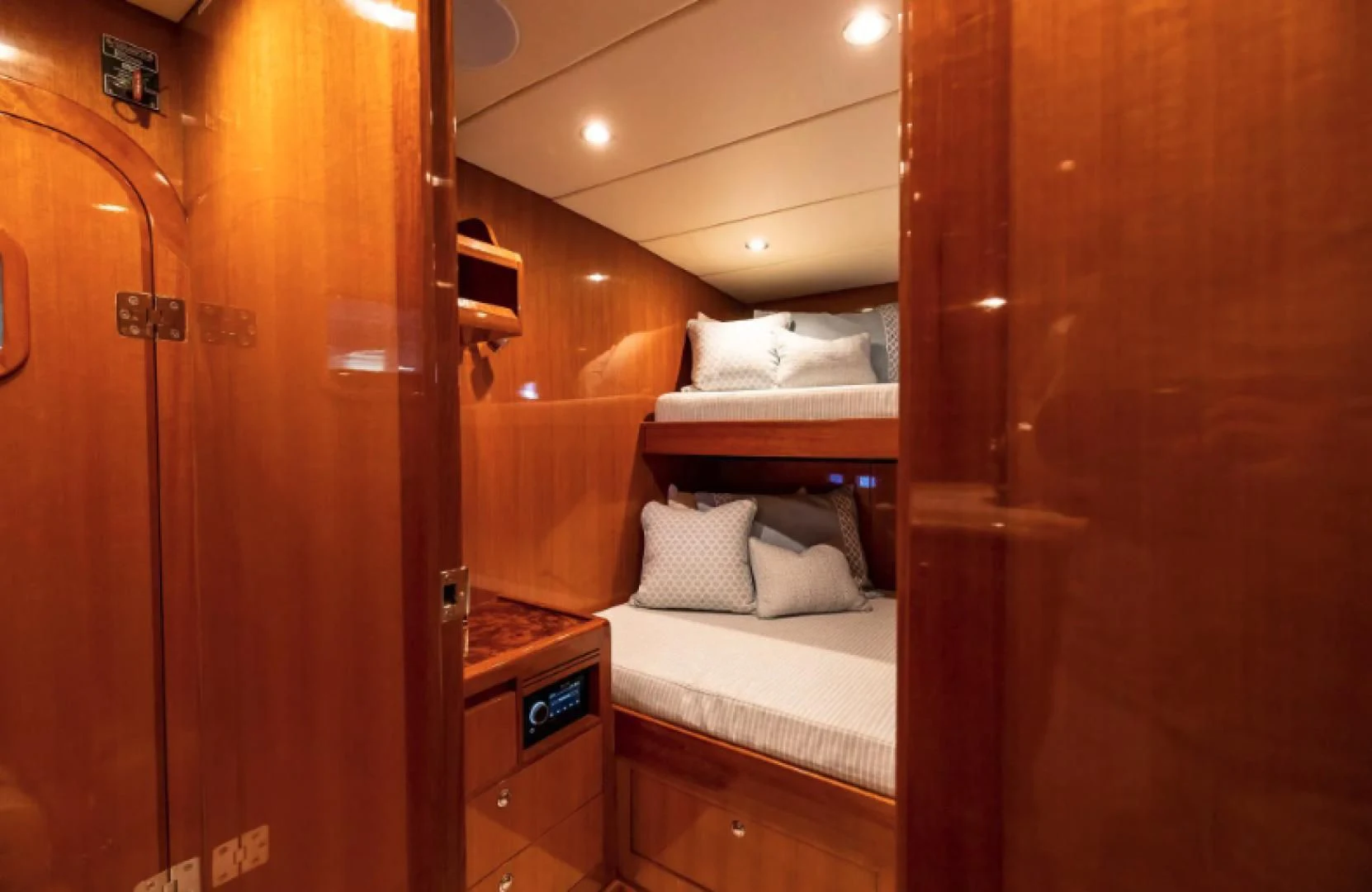 a room with a bed and a closet aboard WRITE SOON Yacht for Sale