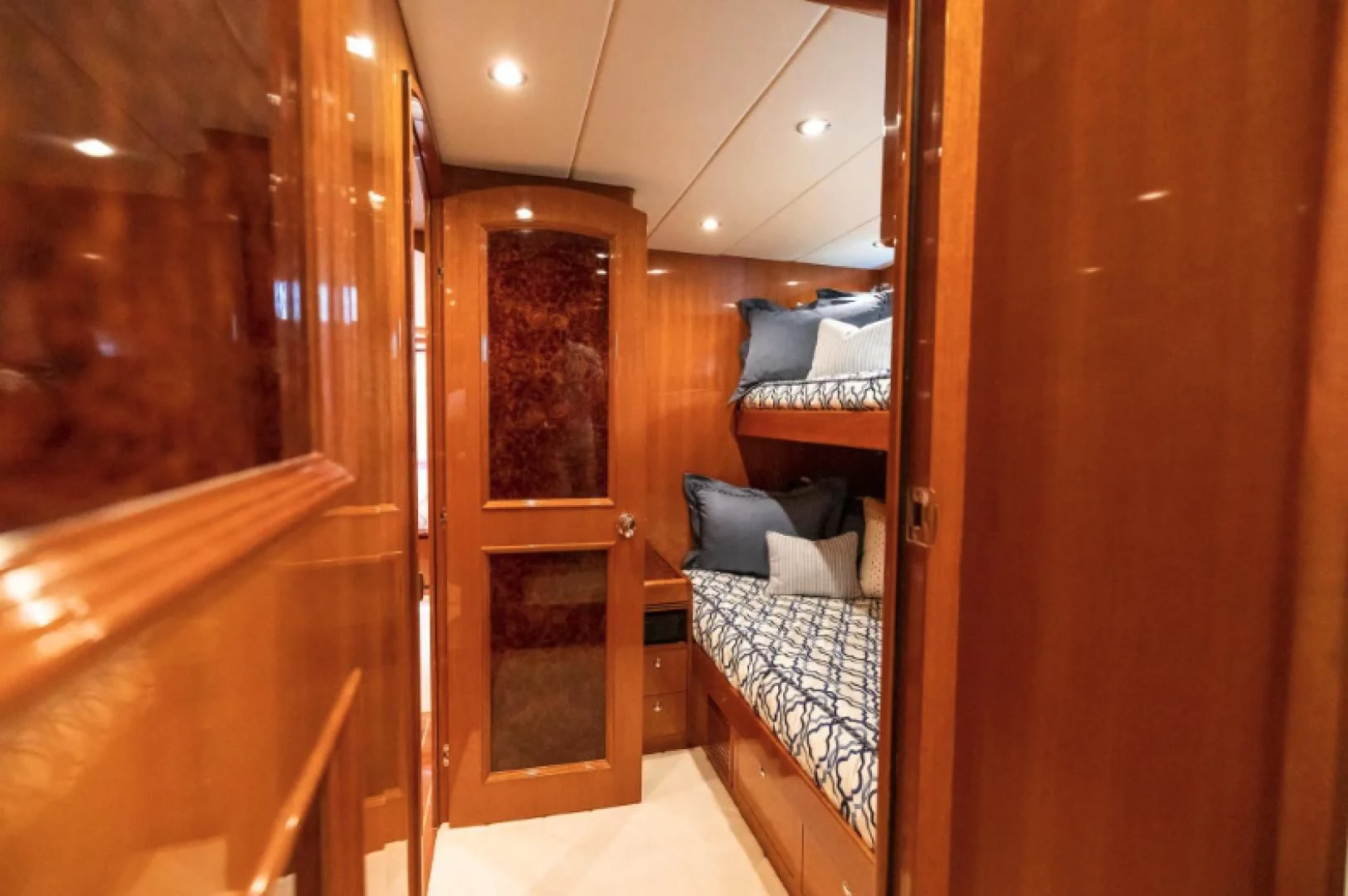 a room with a bed and a door aboard WRITE SOON Yacht for Sale