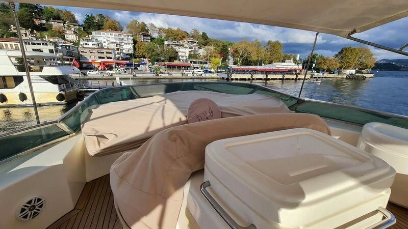a person sitting on a boat aboard ABK Yacht for Sale
