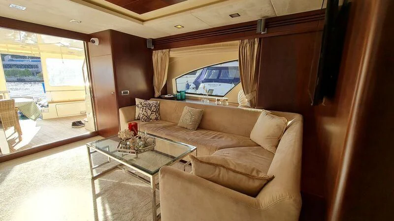 a living room with a large window aboard ABK Yacht for Sale