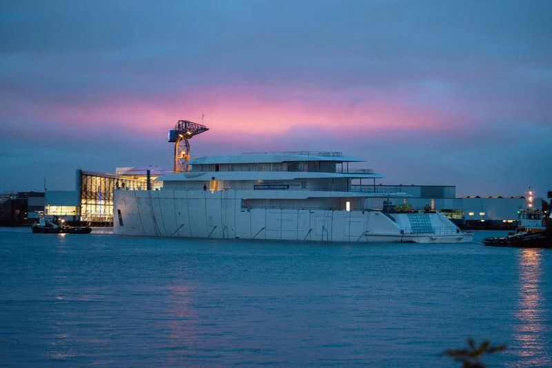 a large white building with a tower on top of it aboard PI Yacht for Sale