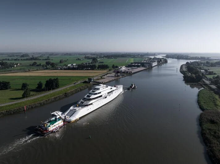 a large ship in the water aboard PI Yacht for Sale