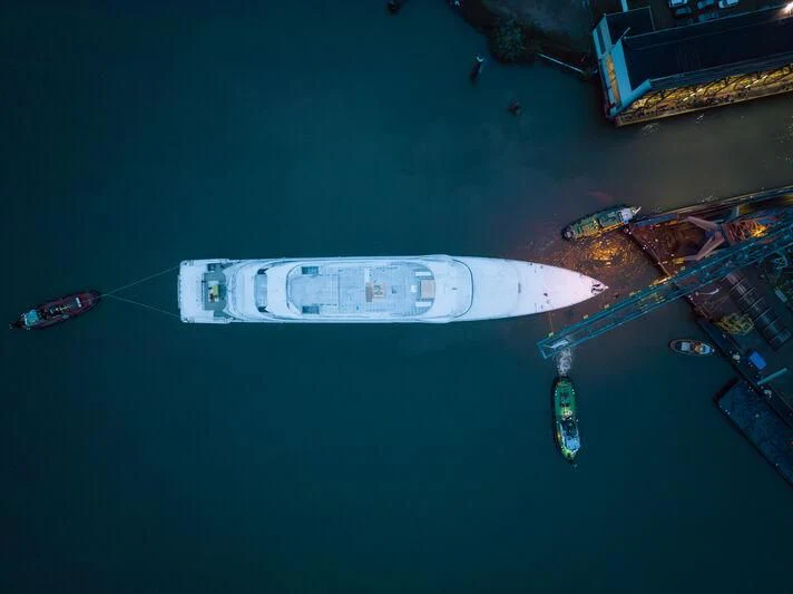a white object on a blue surface aboard PI Yacht for Sale