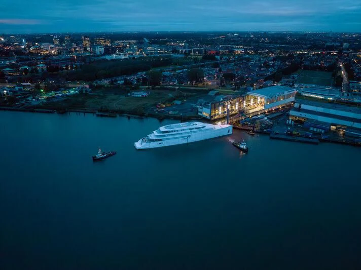 a large body of water with boats and buildings along it aboard PI Yacht for Sale
