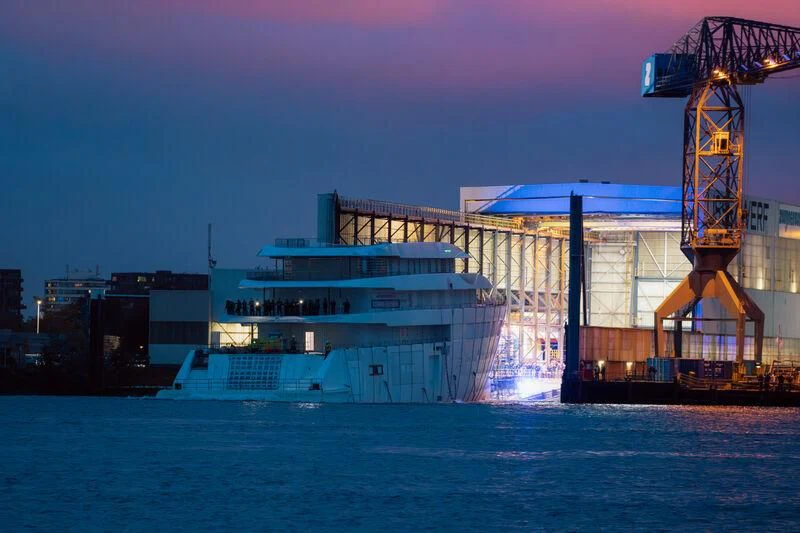 a large factory with a crane aboard PI Yacht for Sale