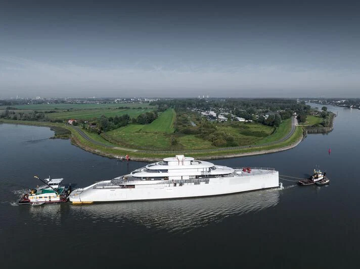 a large ship in the water aboard PI Yacht for Sale