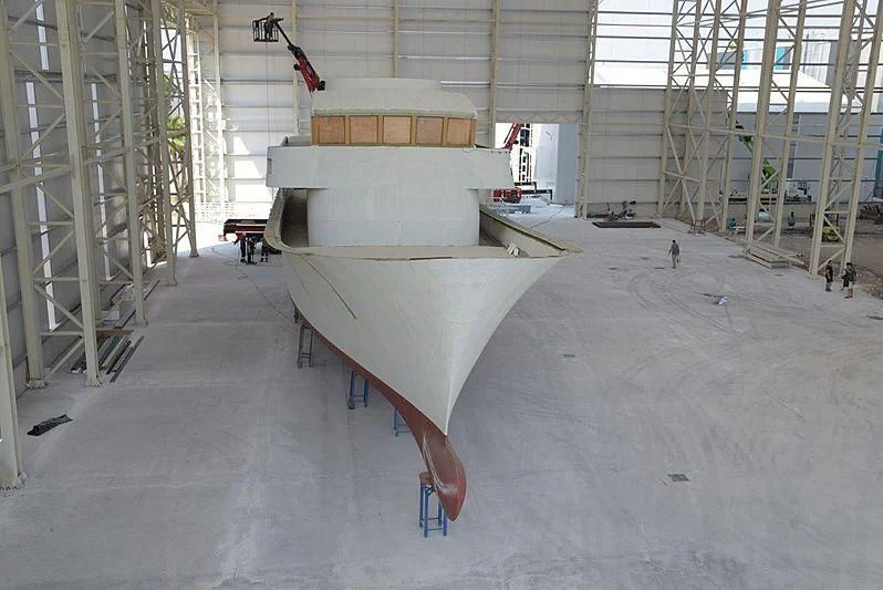 a large room with a large white object on the side aboard FARMONT/PEER GYNT 38M Yacht for Sale