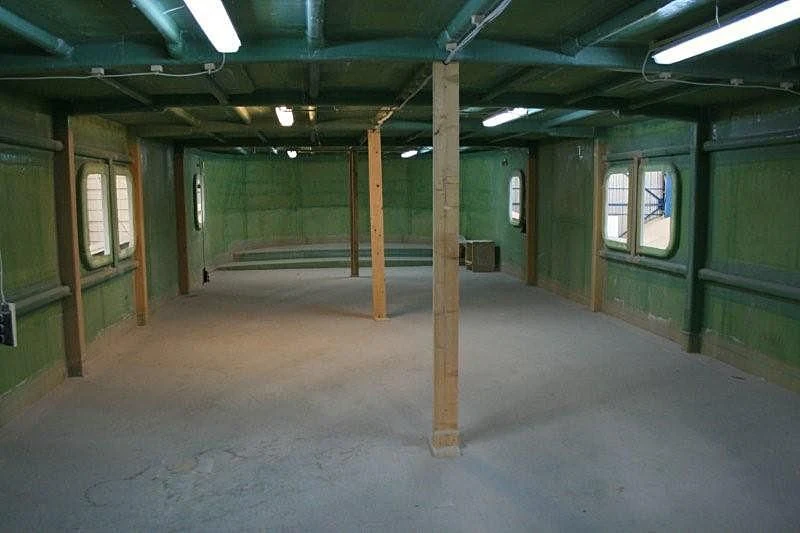 a room with a wood floor and a window aboard FARMONT/PEER GYNT 38M Yacht for Sale