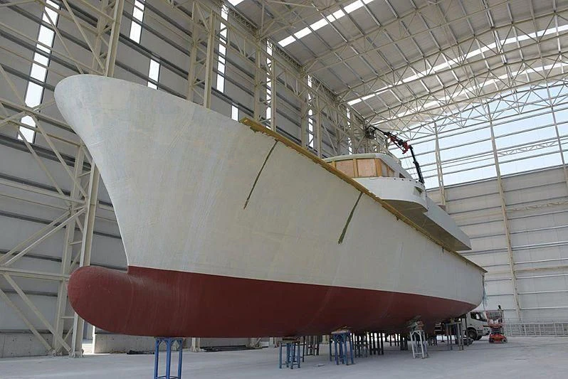 a large space ship in a warehouse aboard FARMONT/PEER GYNT 38M Yacht for Sale