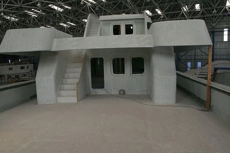 a large room with a large white object in it aboard FARMONT/PEER GYNT 38M Yacht for Sale