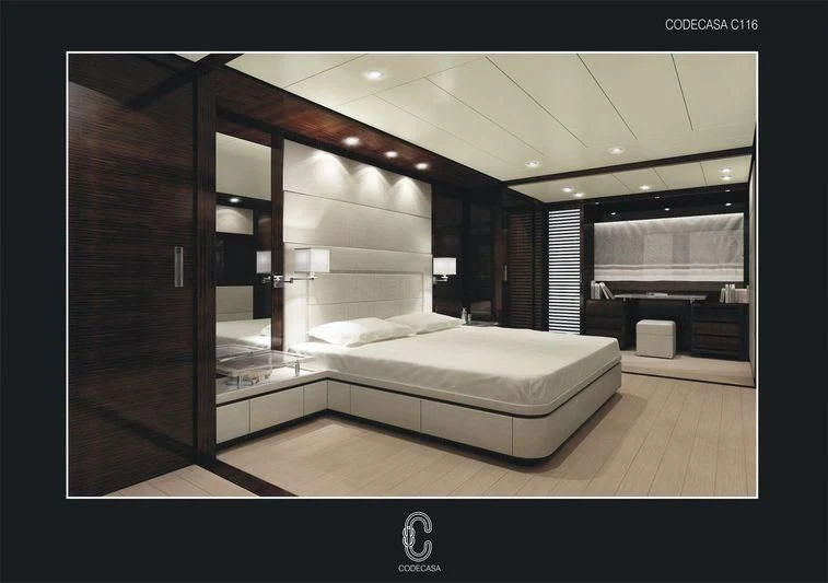 a room with a bed and a mirror aboard ATLAS Yacht for Sale