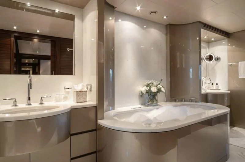a bathroom with a large bathtub aboard ATLAS Yacht for Sale