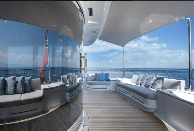 a large living room with a large window aboard ATLAS Yacht for Sale