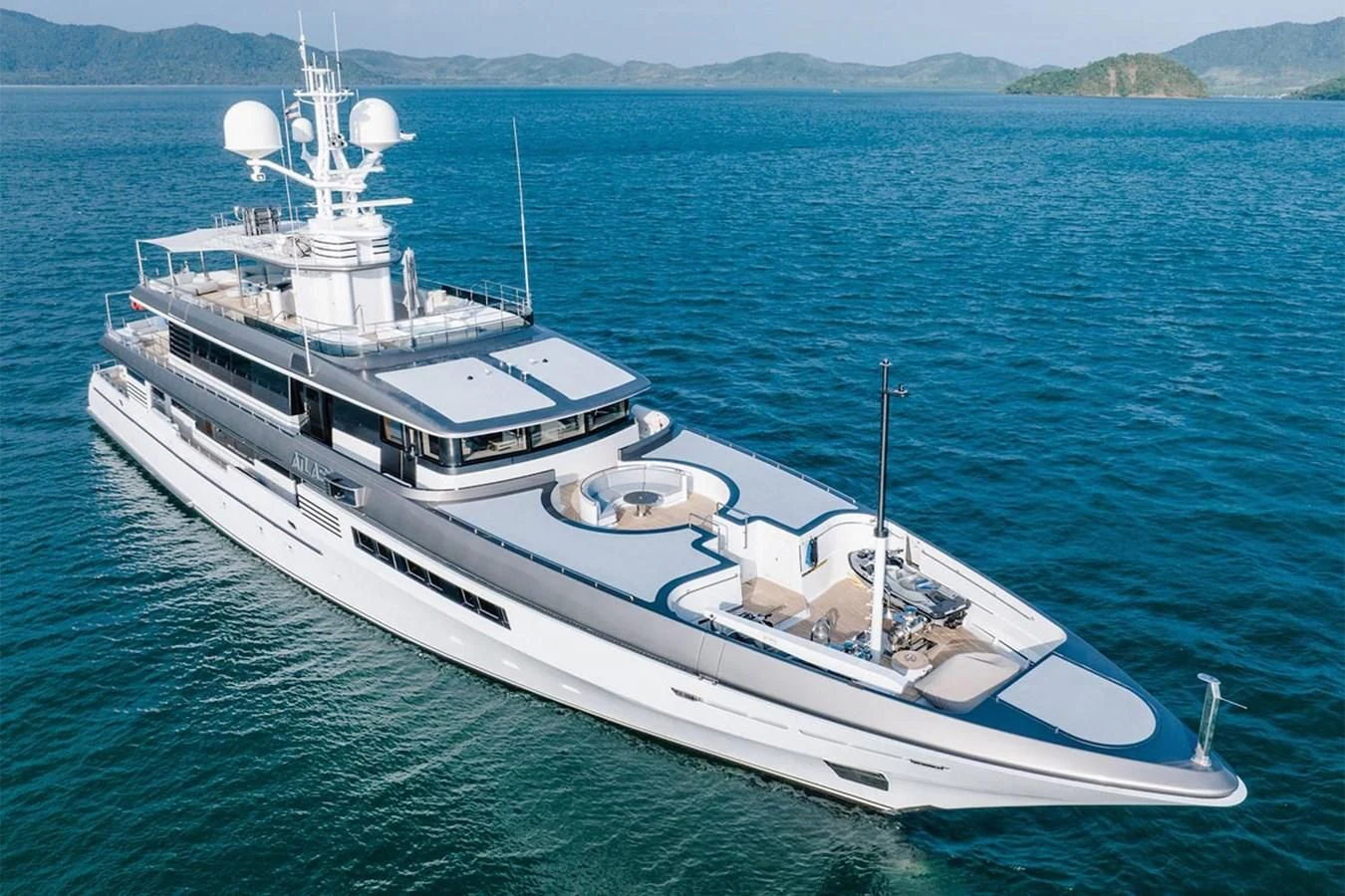 a large ship in the water aboard ATLAS Yacht for Sale