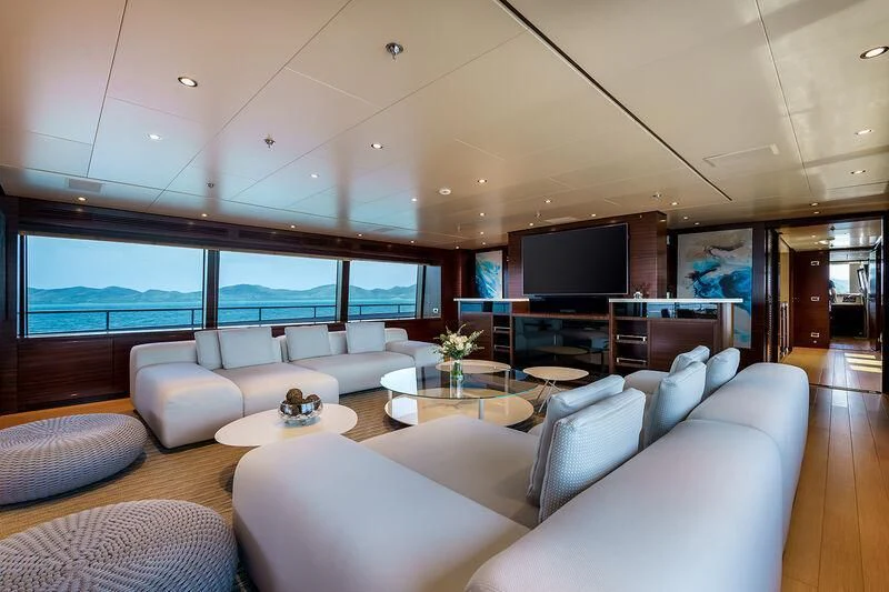 a living room with a large window aboard ATLAS Yacht for Sale