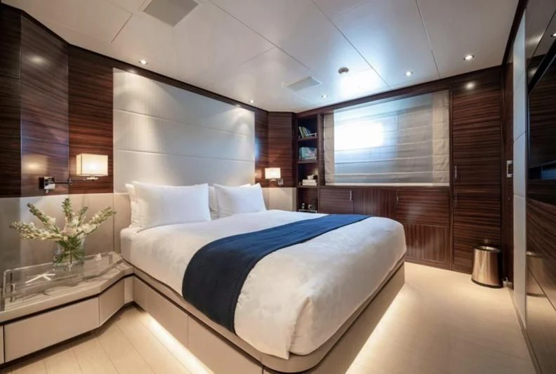 a bed in a room aboard ATLAS Yacht for Sale