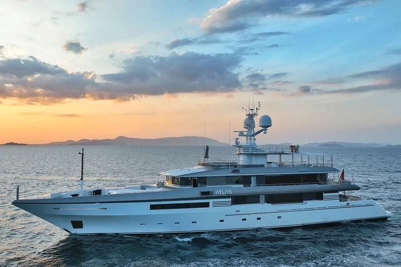 a large white boat on a beach aboard ATLAS Yacht for Sale