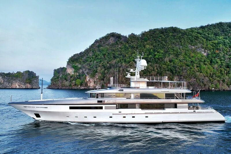 a white yacht in the water aboard ATLAS Yacht for Sale