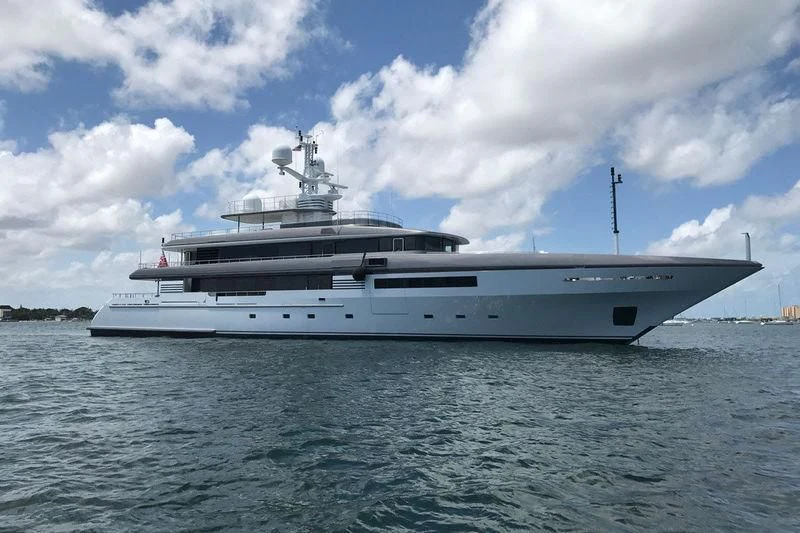 a large white ship on the water aboard ATLAS Yacht for Sale