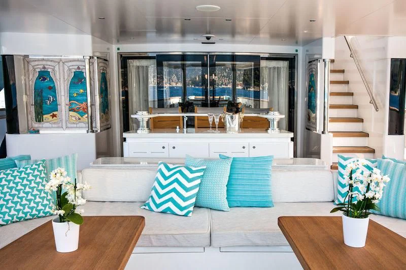 a living room with a large window aboard LATONA Yacht for Sale