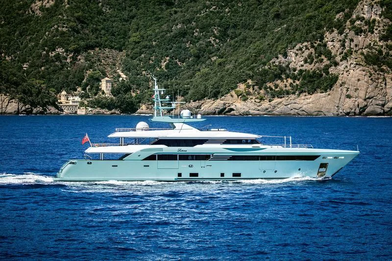 a white boat on the water aboard LATONA Yacht for Sale