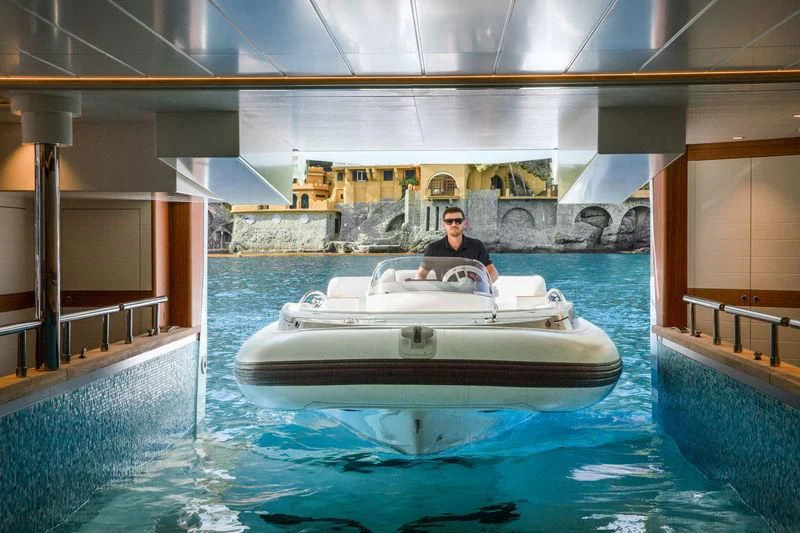 a person in a white boat aboard LATONA Yacht for Sale