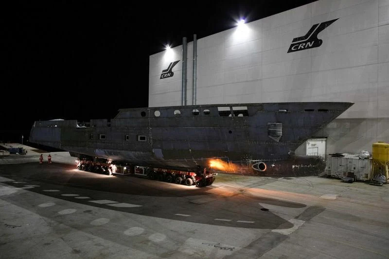 a large military ship aboard LATONA Yacht for Sale
