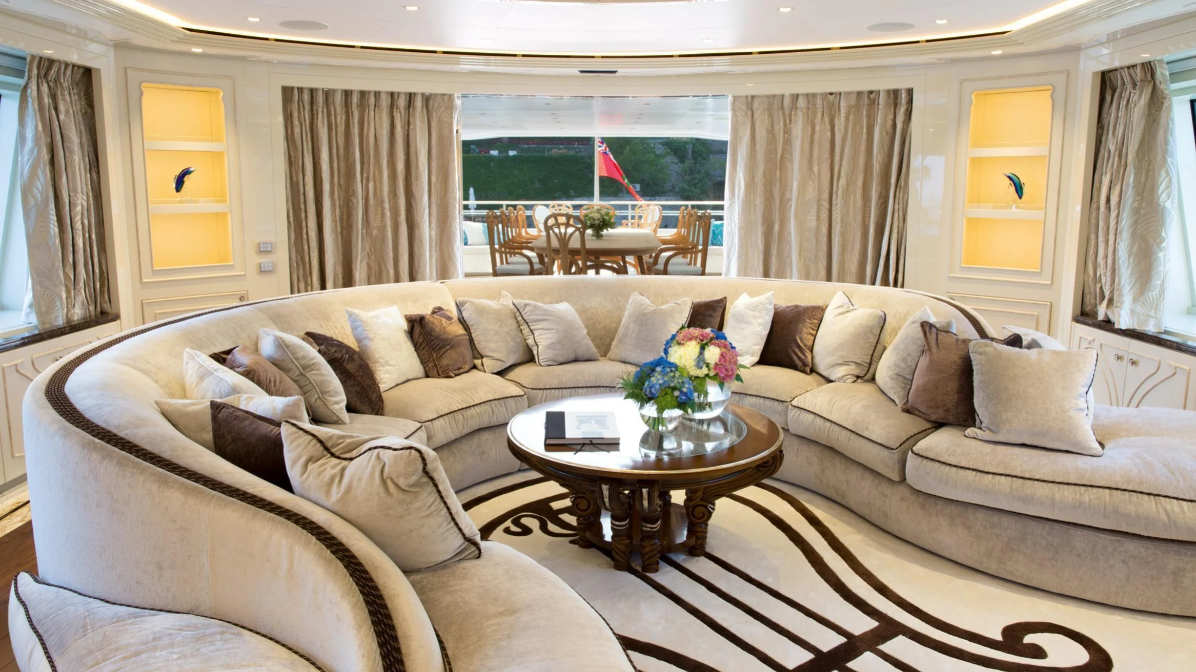 a living room with a couch and a coffee table aboard LATONA Yacht for Sale
