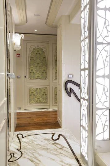 a room with a door and a shower aboard LATONA Yacht for Sale